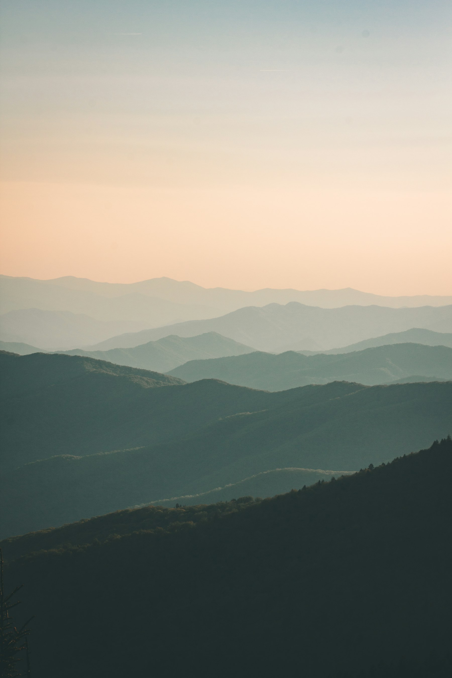Layered mountain landscape at sunrise